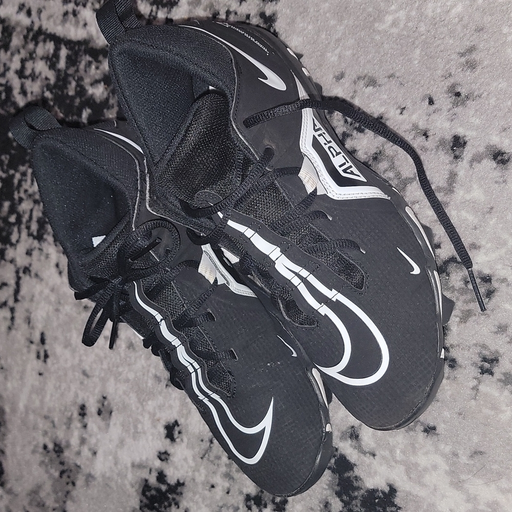 Nike fast flex football cleats, men's size 8.5, black and white
